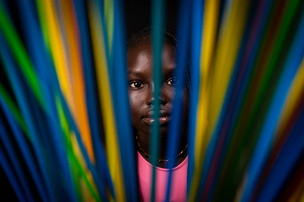 Portrait Young African Girl Stands Long Colored Drinking Straws Studio — Stock Photo, Image