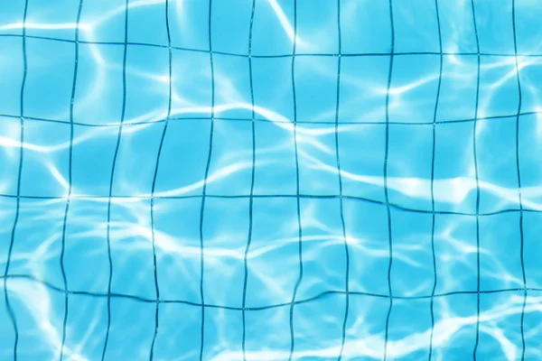 Azul ondulado fundo de água na piscina — Fotografia de Stock