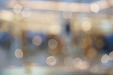 Mağaza alışverişinde sepya rengi arka planda Bokeh ışıkları