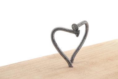 steel bent nails on white background