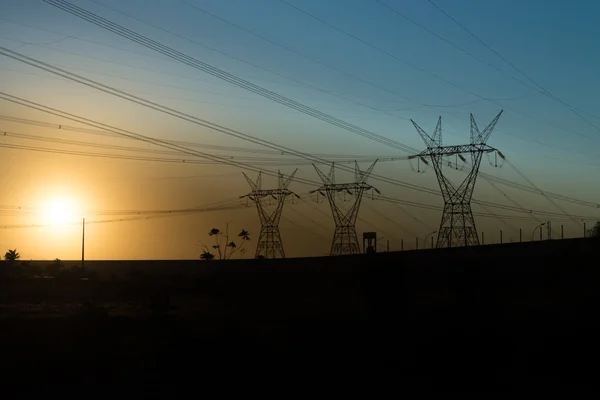 Power lines at the sunset near Itaipu dam