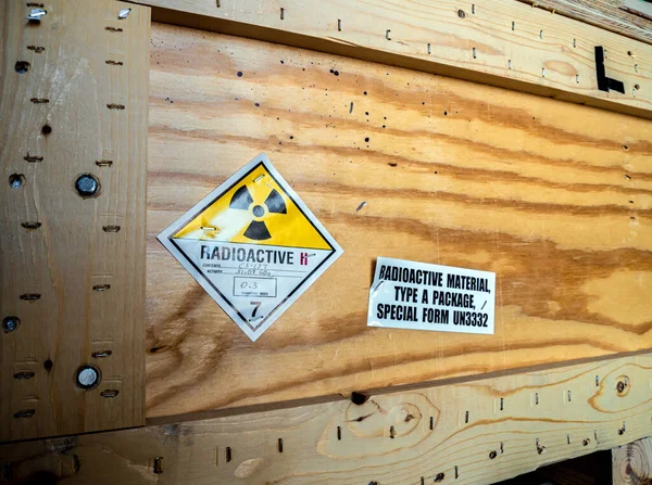 Radioactive material label beside the transportation wooden box Type A standard package