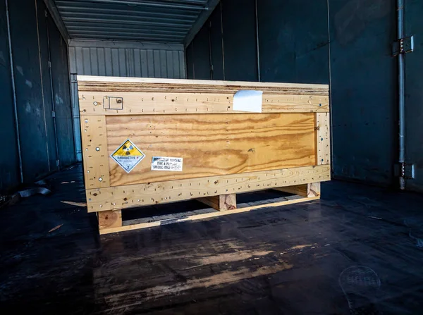 Radioactive material label beside the transportation wooden box Type A standard package