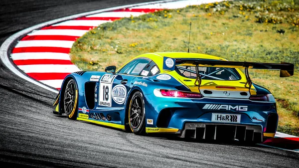 Oschersleben, Almanya, 26 Nisan 2019: Josef Kluber Almanya 'daki Motorsport Arena' da Spezial Tourenwagen Kupası sırasında bir Mercedes AMG GT3 kullanıyor.