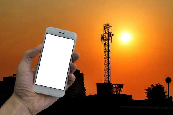 Stor antenn med solnedgången, hålla en smart telefon — Stockfoto