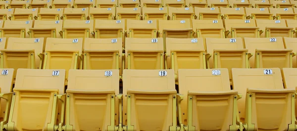 Yellow seats on the grandstand — Stock Photo, Image