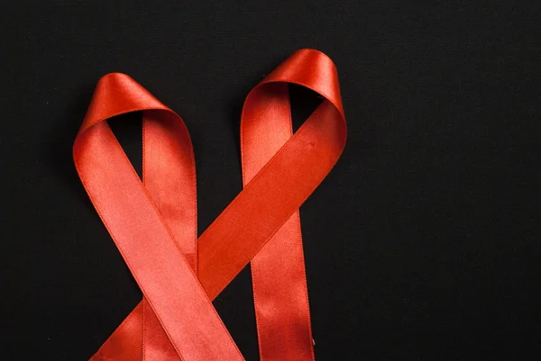 Червона стрічка ВІЛ, СНІД — стокове фото