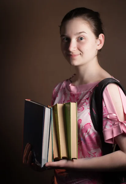 Sweet and young girl with books — Stock Photo, Image