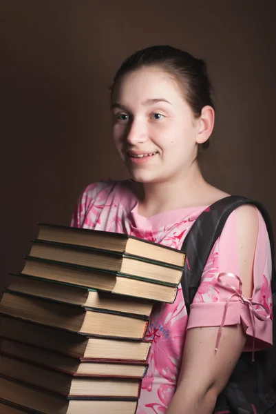 Sweet and young girl with books — Stock Photo, Image