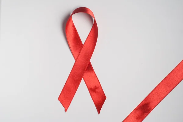 Aids awareness red ribbon — Stock Photo, Image