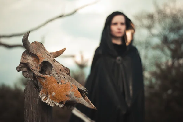 Young witch in a forest — Stock Photo, Image