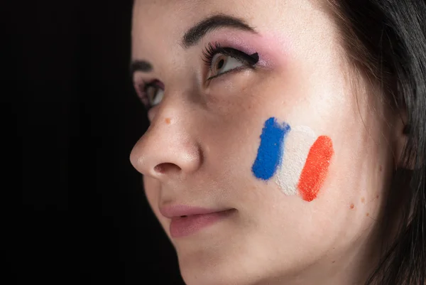 Visage de femme peint avec drapeau de France — Photo