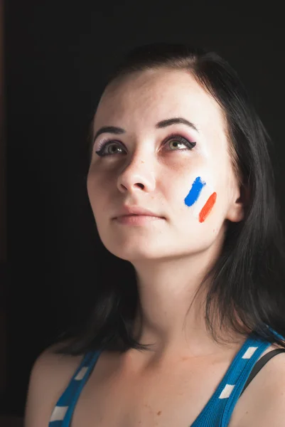 Twarz pomalowana kobieta z flaga Francji — Zdjęcie stockowe