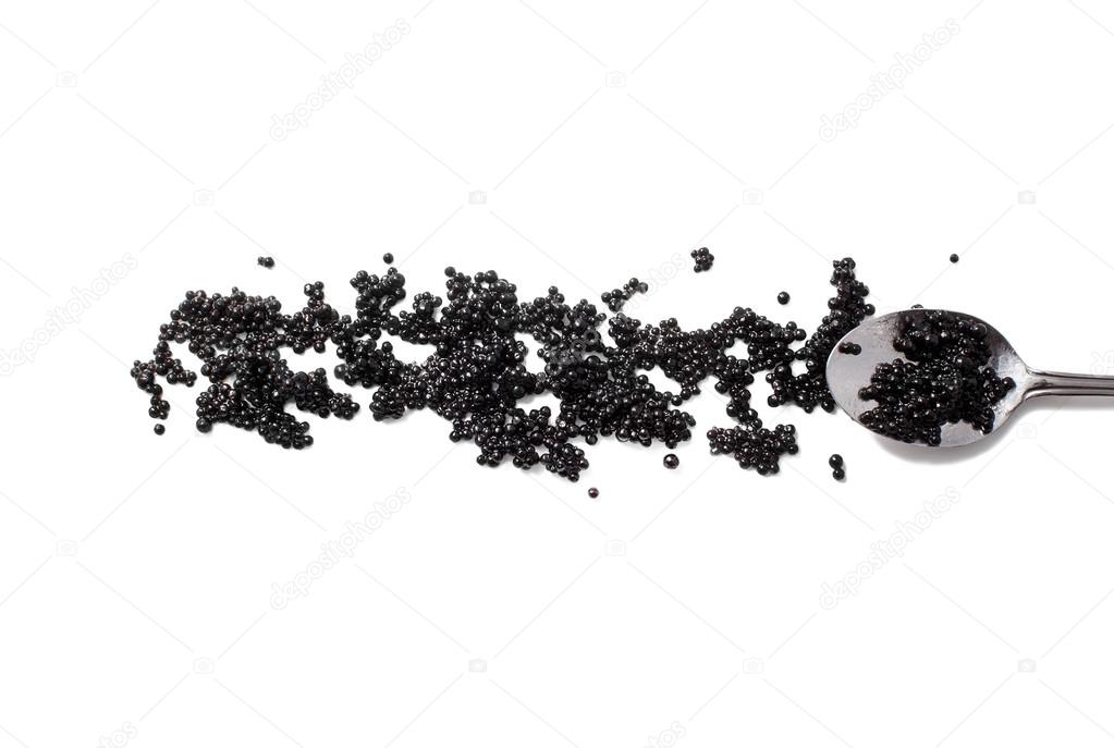 black caviar and spoon isolated on white background