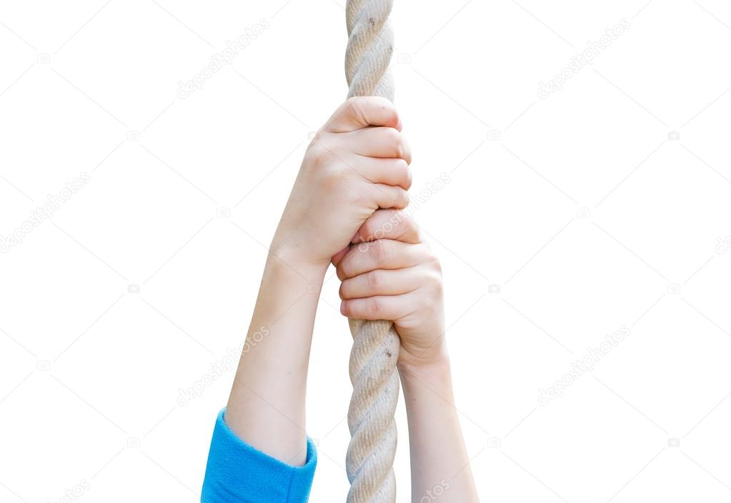 children's hands holding the rope
