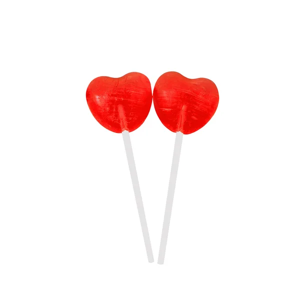 Pair of red lollipops in heart shape — Stock Photo, Image