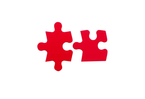 iki kırmızı jigsaw parçaları
