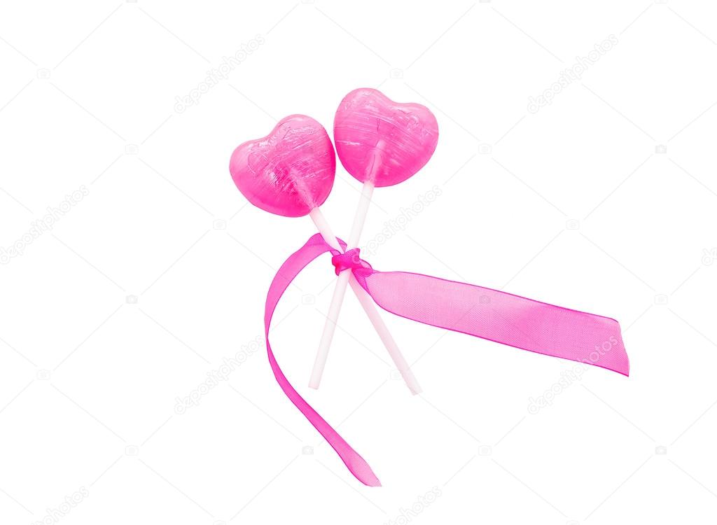 two lollipop in heart shape isolated on white background