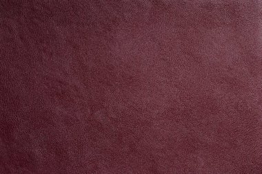 Saf deriden yapılmış koyu kırmızı bir kumaş. Doğal pahalı ürünler..