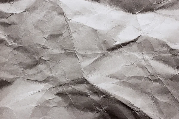 Zerknitterte und zerkleinerte weiße Papiertextur Hintergrund — Stockfoto
