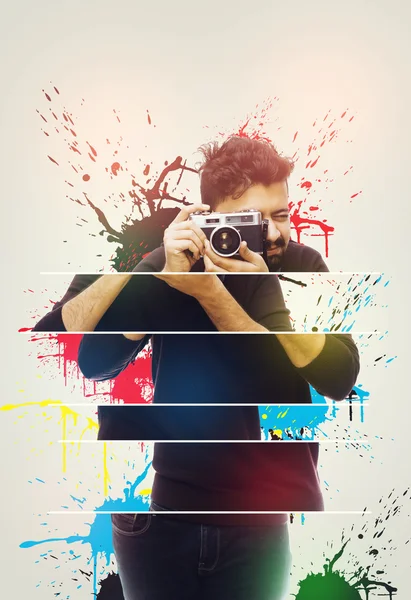 Photographer. Close up portrait of guy holding vintage camera — Stock Photo, Image