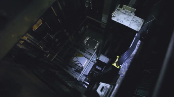 Lift Moves Down. Mechanism of the Back Side of the Elevator. Lift Shaft — Stock Video