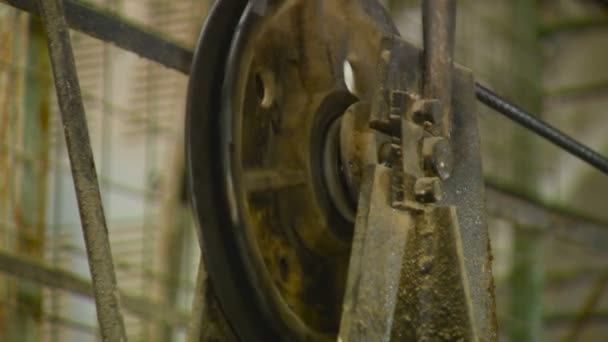 Steel Rope and the Wheel Turns. Closeup — Stock Video