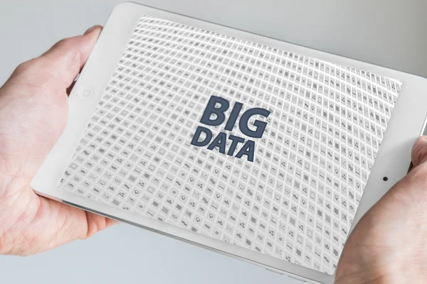 Two hands holding tablet. Big data concept. — ストック写真