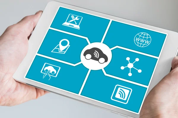 Connected car and digital mobility concept. Hand holding modern tablet. — Stock Photo, Image