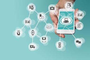 Akıllı telefon tutan el ile dijital ve Mobil Sağlık kavramı