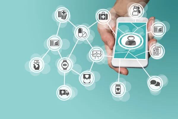 Akıllı telefon tutan el ile dijital ve Mobil Sağlık kavramı