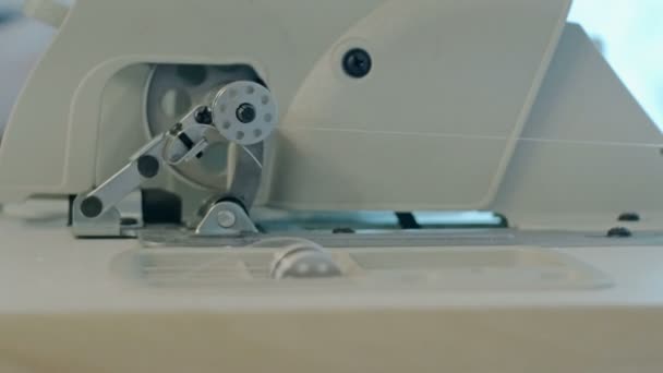 Sewing machine - spinning a bobbin — Stock Video