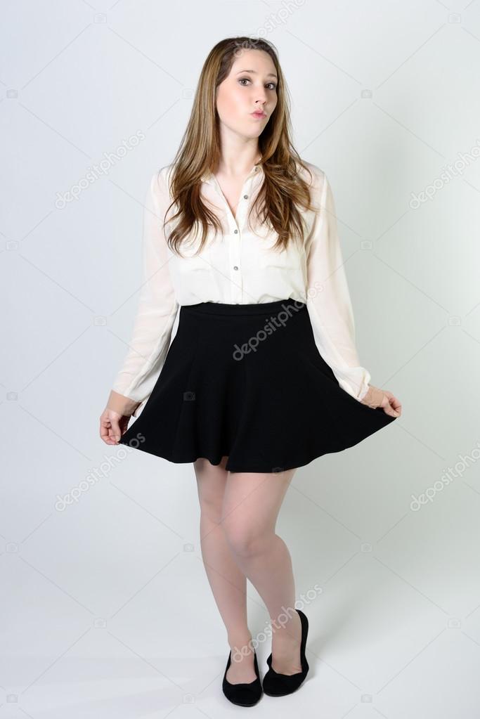 woman holding skirt