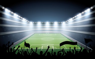 Heyecanlı kalabalığın bir futbol stadyumu.