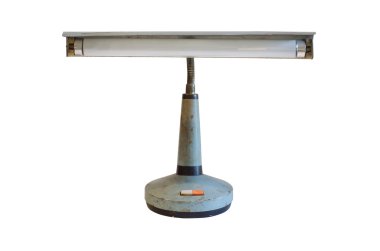 Old metal table-lamp on white background. clipart