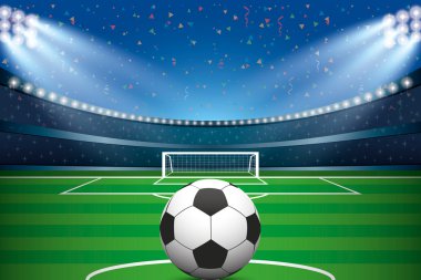 Futbol topu Futbol Stadyumu ve konfeti arka plan ile.