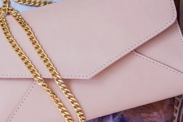 Pink clutch in form of an envelope