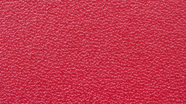 Soyut deri dokusu yivli yüzey, parlak tasarım arka plan, canlı kırmızı renk, boşluğu kopyala