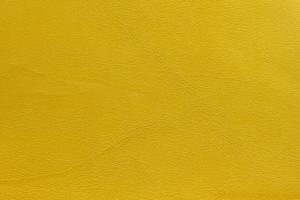 Textura de Cuero Genuino con arruga, pliegue, color amarillo de moda, fondo — Foto de Stock