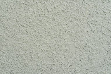 Açık yeşil renkli beton duvarın dokusu. Stucco Wall yakın plan, arkaplan
