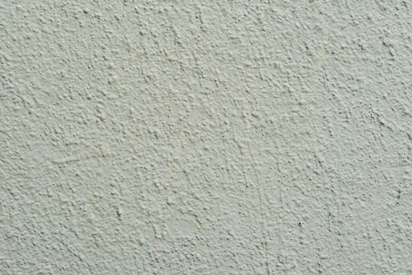 Tekstura malowanej jasnozielonej ściany betonowej. Stucco Ściana zbliżenie, tło — Zdjęcie stockowe
