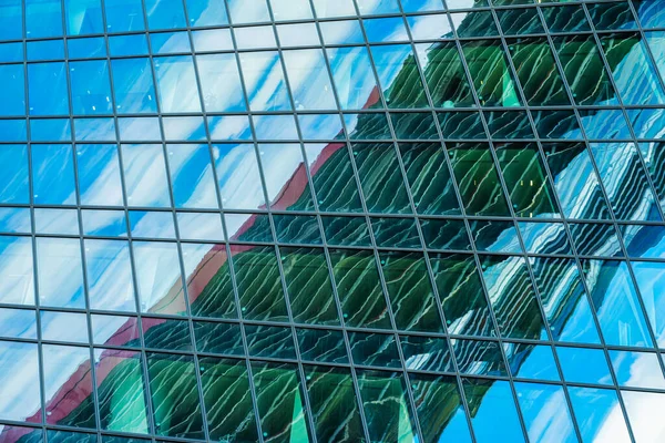 Blurred abstract reflection in skyscraper window panes, colorful modern background — Zdjęcie stockowe