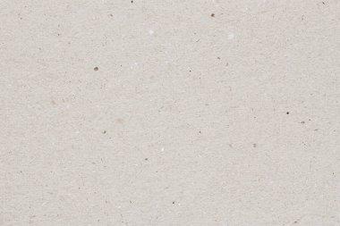 Yüzeyde ince lifler ve yumuşak tahıl detaylarıyla doğal bej kağıt dokusu. El işi kağıt dokusu, eko tasarımı, taklit kopya alanı ve organik zemin kavramı