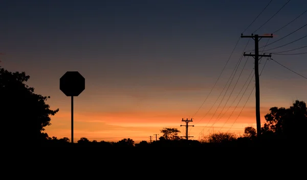 Stoppschild in Silhouette — Stockfoto