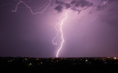 Lightning over city clipart
