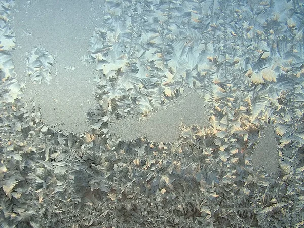 Eismuster Auf Dem Gefrorenen Fensterglas — Stockfoto
