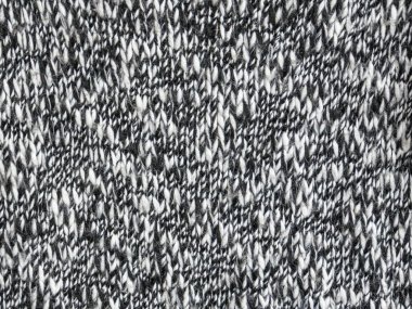 Siyah beyaz akrilik ve pamuk bir formanın yüzeyine yakın çekim. Doku. Arkaplan.