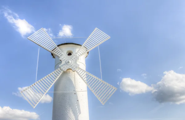 Lighthouse windmill in Swinoujscie — Stock Photo, Image