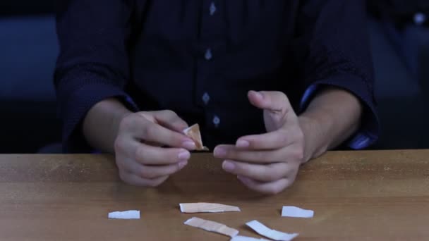 Young Doctor Shows People How Properly Apply Patch Cut Finger — Stock Video