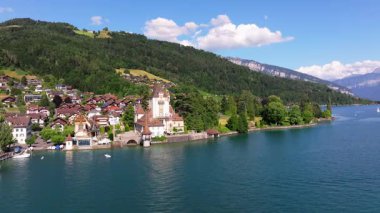 The beautiful Interlaken valley and Thunersee lake, Beatiful river at Switzerland in sunny day during summer, Aereal drone view of stunning idyllic nature scenery of lake Brienz with turquoise waters